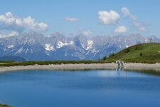 wasserspeicher penglstein dahinter kaisergebirge